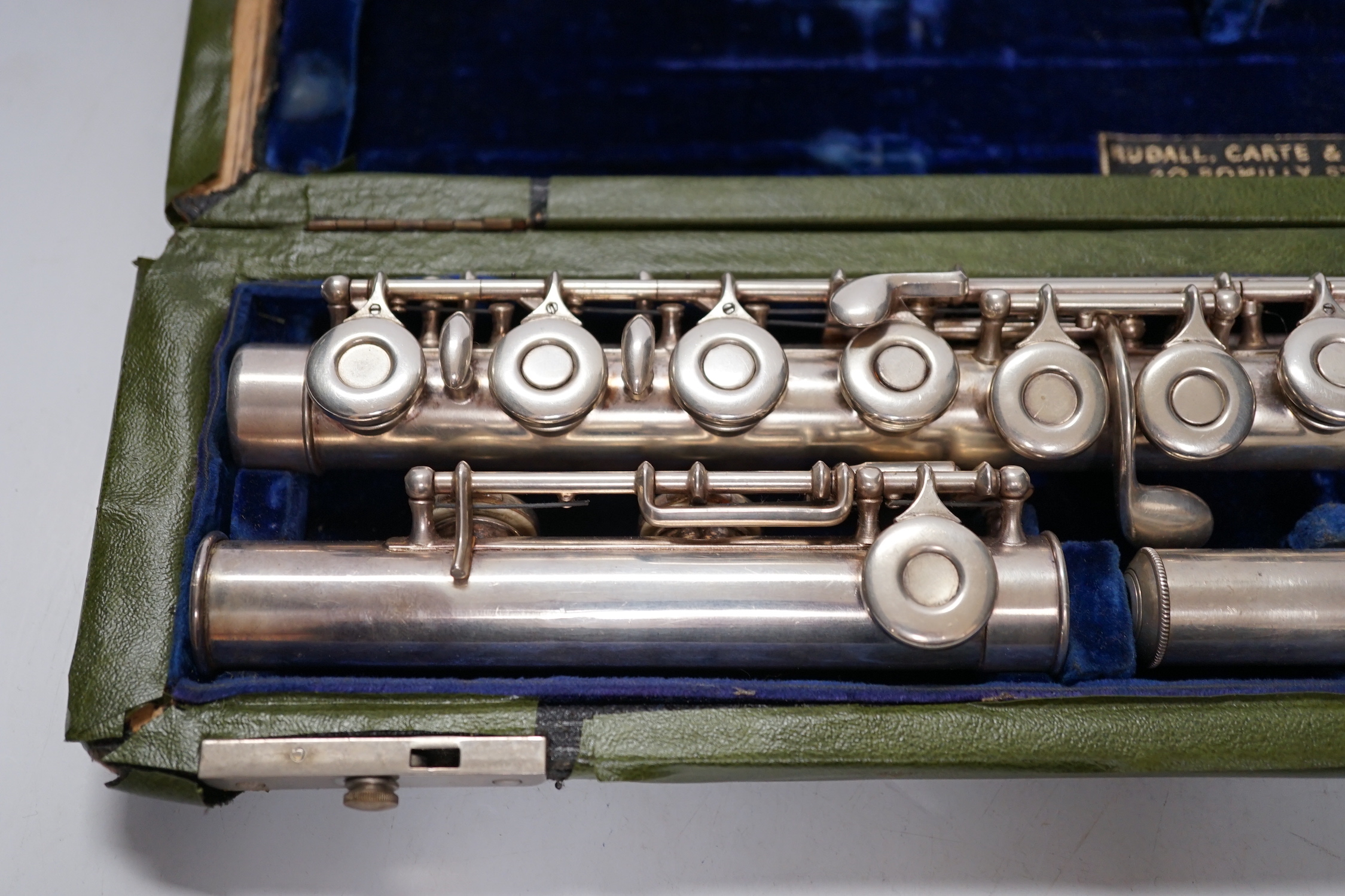 A cased Rudall, Carte & Co. flute, with closed hole key work and sterling silver head joint